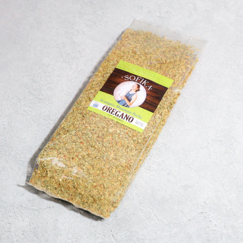 Package of oregano with a visible brand label on a light gray background