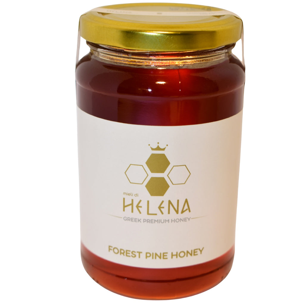 Jar of Helena Forest Pine Honey with a gold lid on a white background